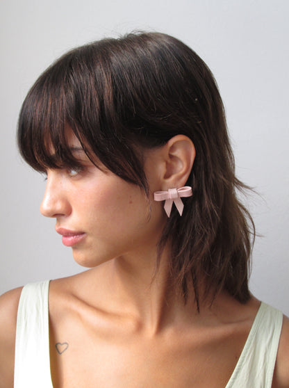 Blush pink bow clay earrings